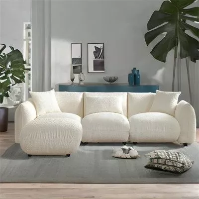 Transform your living area with this stylish white sectional sofa. It's the perfect blend of modern design and plush comfort, ideal for any chic home.