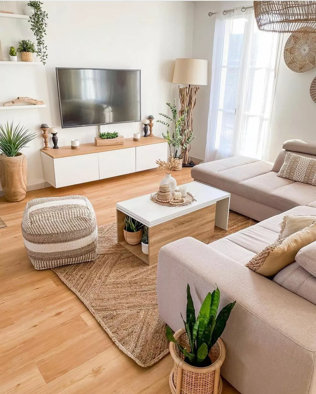 Dive into the serene ambiance of this boho neutral living room, complete with cozy textures and earthy tones. Perfect for those who crave both style and comfort.