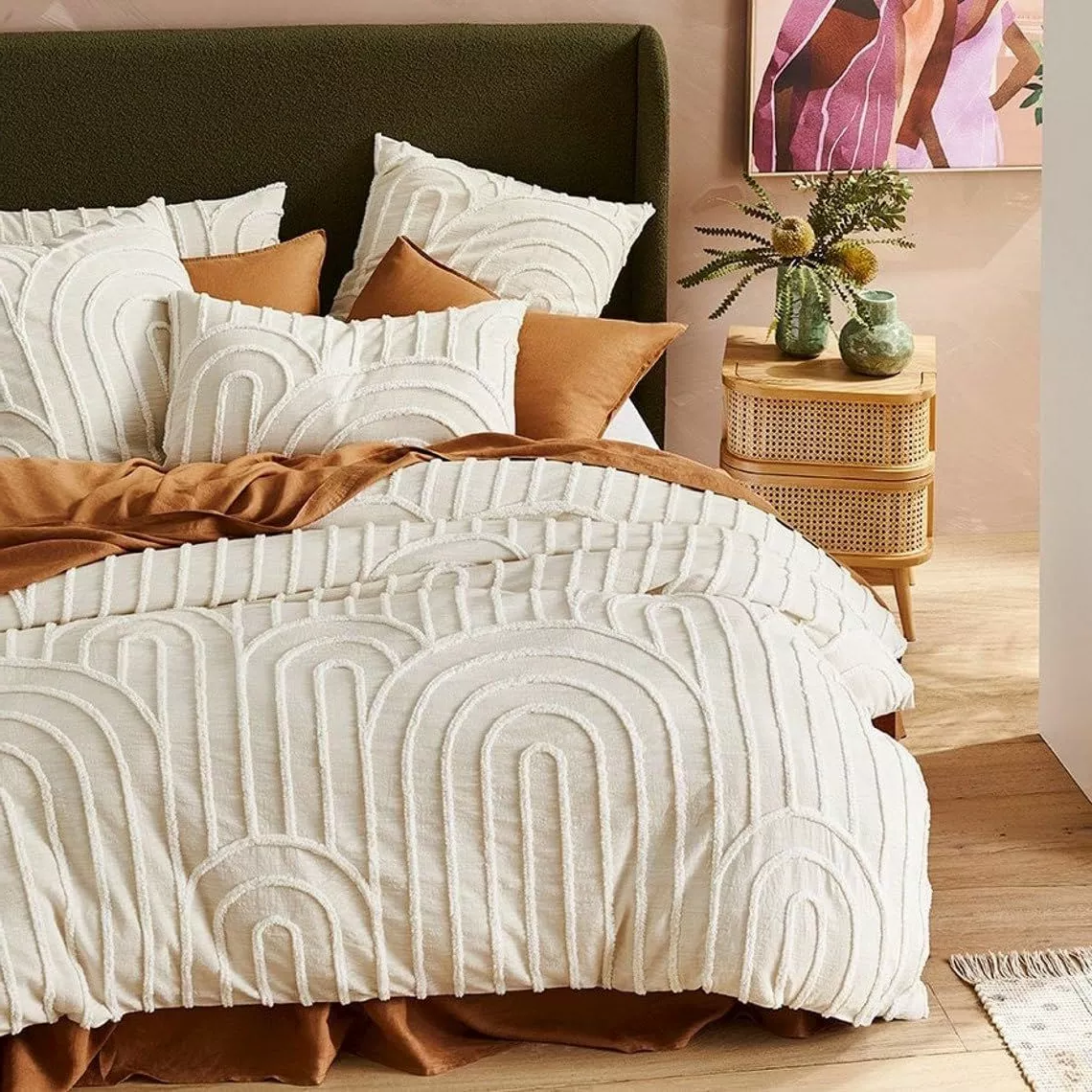 Discover the perfect blend of cozy bedding and artistic décor that elevates any bedroom into a stylish haven.