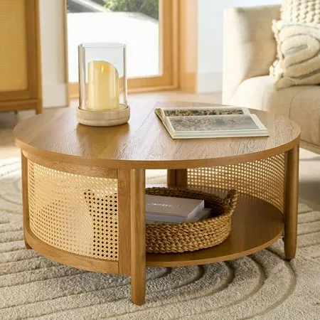 Discover the perfect blend of contemporary design and rustic charm with this chic round rattan coffee table, ideal for any living space.