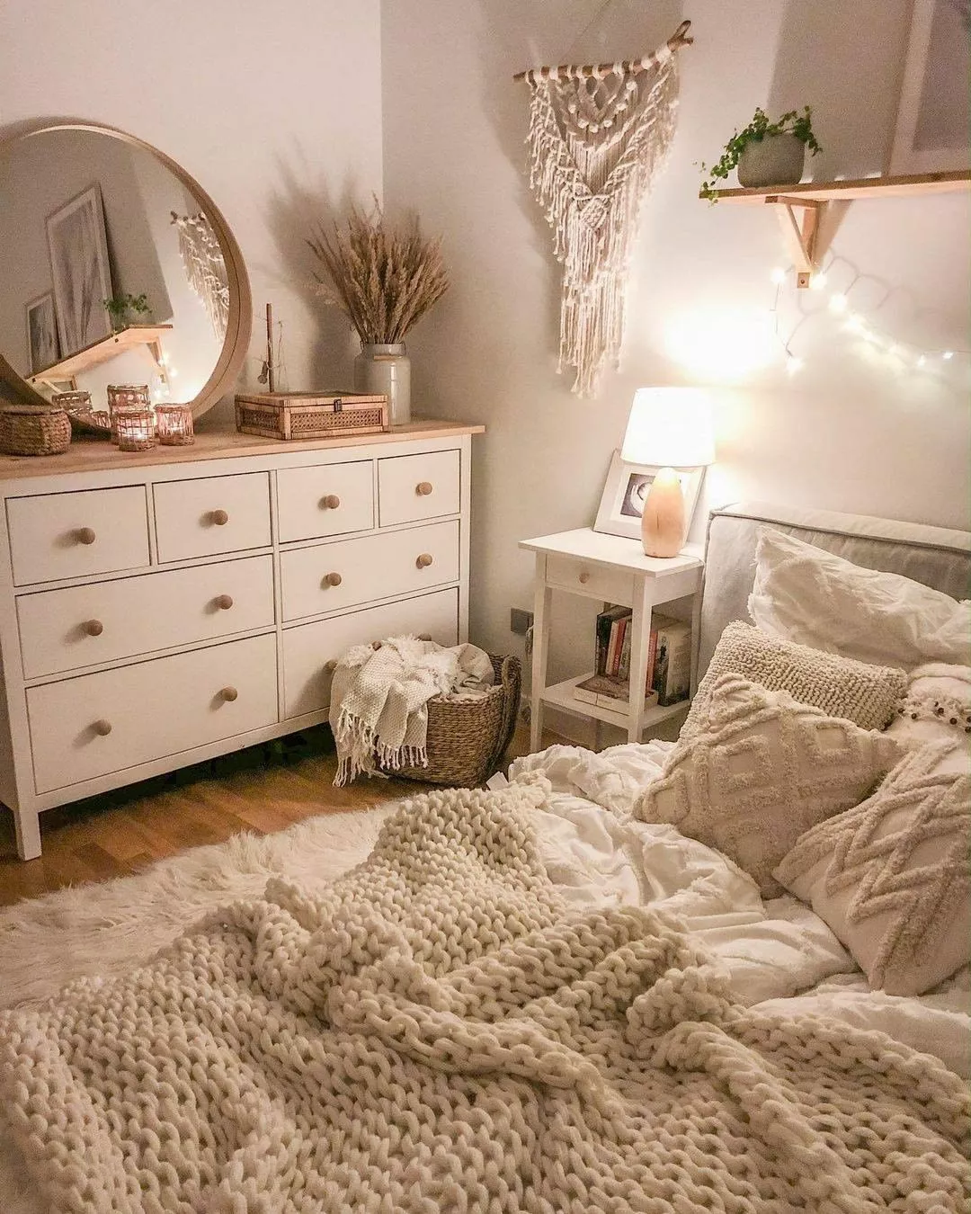 Discover this inviting boho-chic bedroom with plush textures, soft lighting, and natural accents that create a serene and stylish retreat.