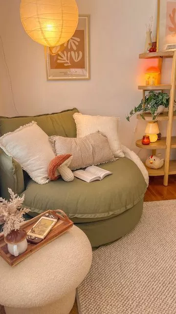 Transform your space with an inviting green round chair, plush cushions, and soft lighting for a serene retreat.