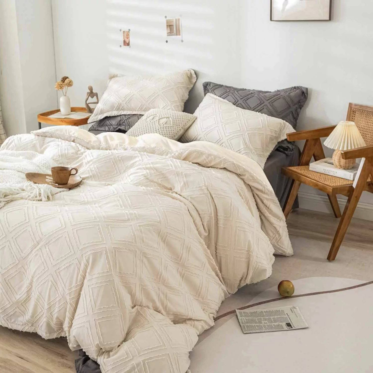 Enjoy the comfort of an earthy bedroom featuring cozy linens, natural wood accents, and warm neutral tones.