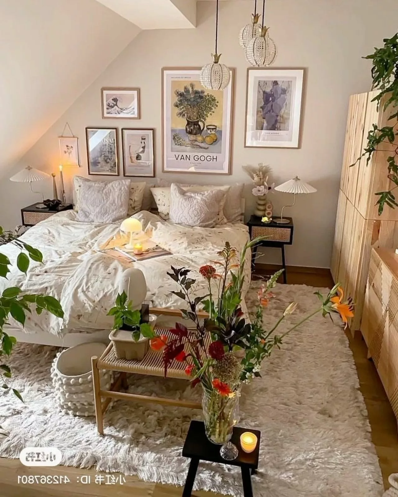 Discover the serene charm of this elegantly designed bedroom, blending floral accents, neutral tones, and nature-inspired art for a peaceful retreat.