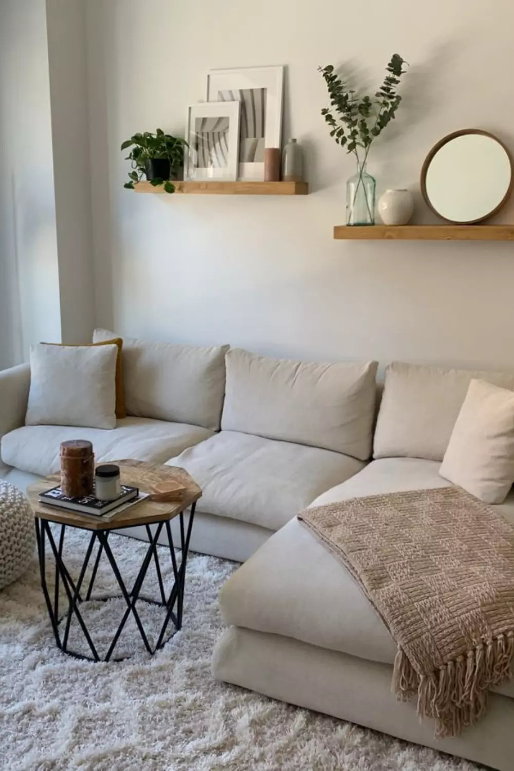 Discover the perfect blend of comfort and style with this elegantly minimalist living room. Neutral tones and natural textures create a serene oasis.