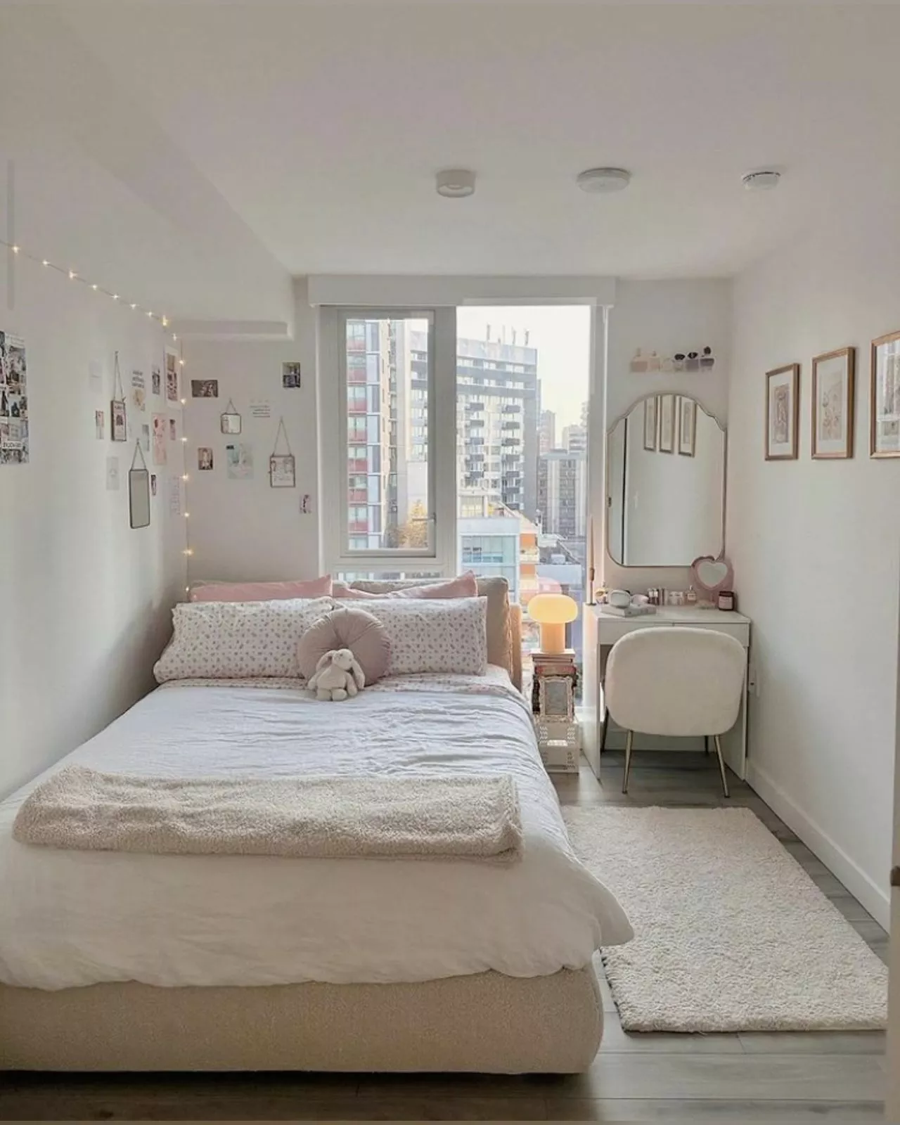 Dive into the charm of this modern bedroom with soft hues, elegant decor, and a warm, inviting atmosphere perfect for a restful retreat.