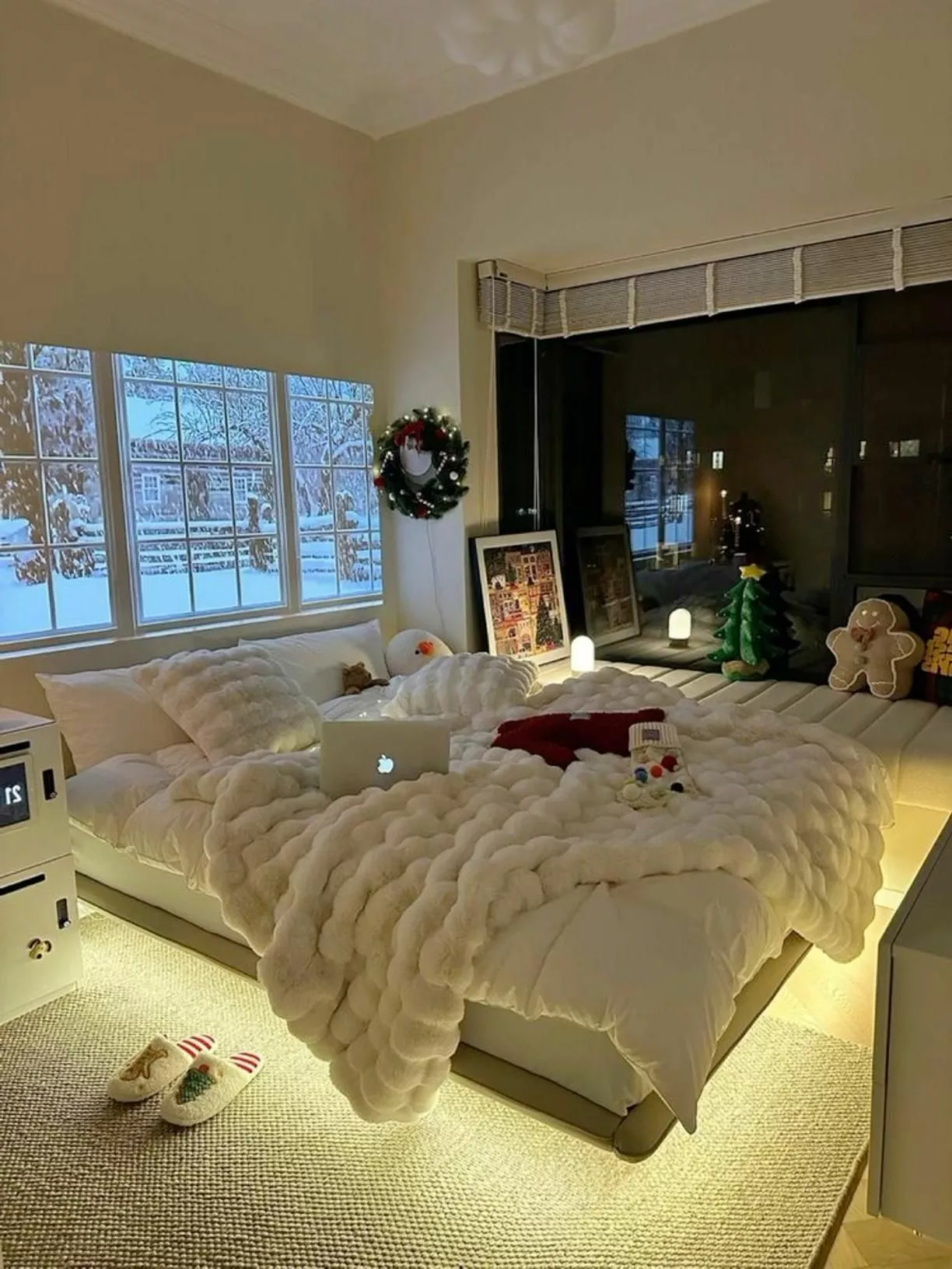 Step into a serene oasis with plush decor and winter-themed touches making this bedroom a perfect haven.