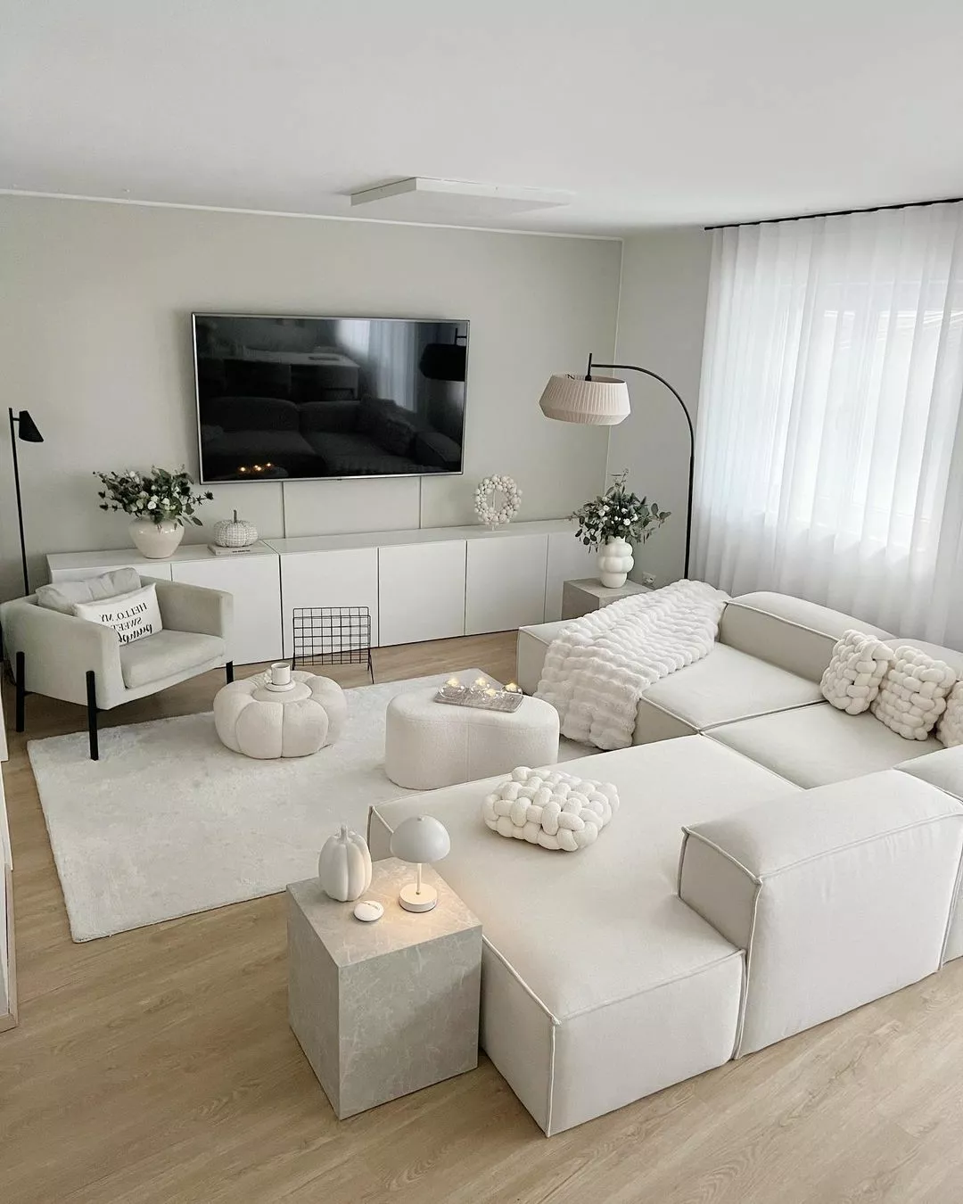 Discover the sophisticated charm of a minimalist living area where elegance meets simplicity.