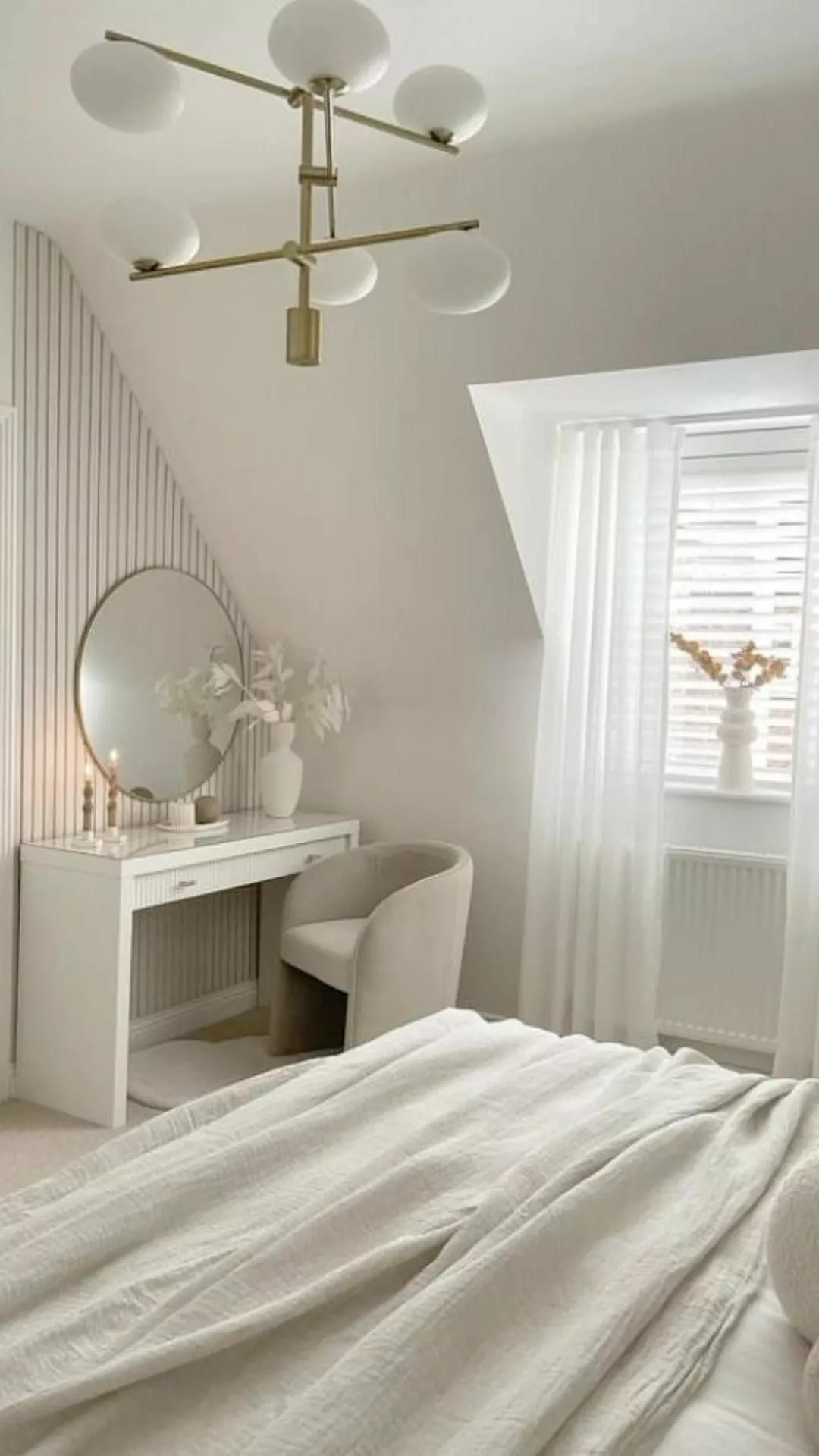 Discover the serene beauty of this minimalist white bedroom, featuring sleek furniture, soft textiles, and modern decor for a tranquil retreat.