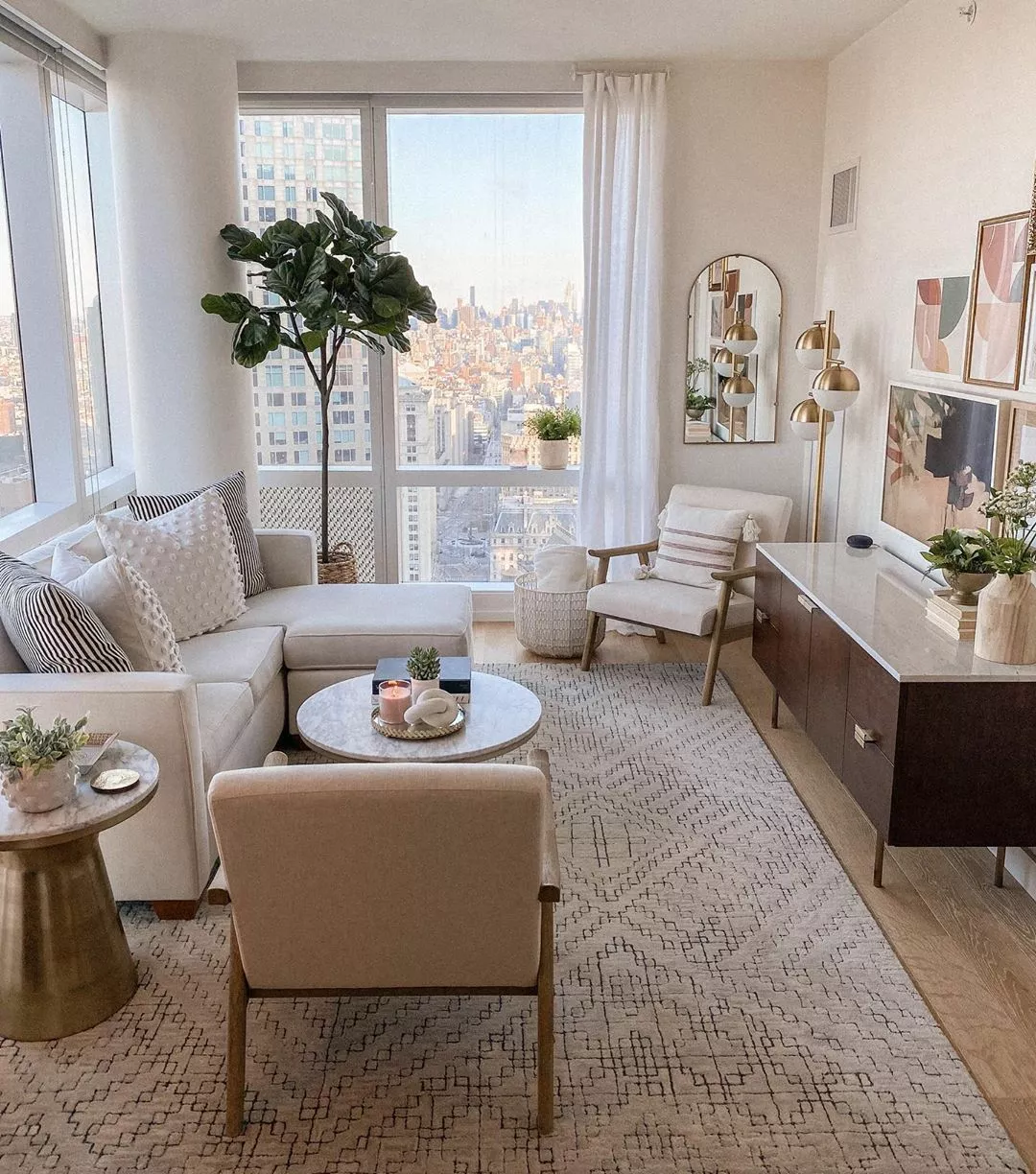 Discover the charm of this urban oasis, featuring chic furniture, warm tones, and stylish decor that transforms city living into a serene retreat.