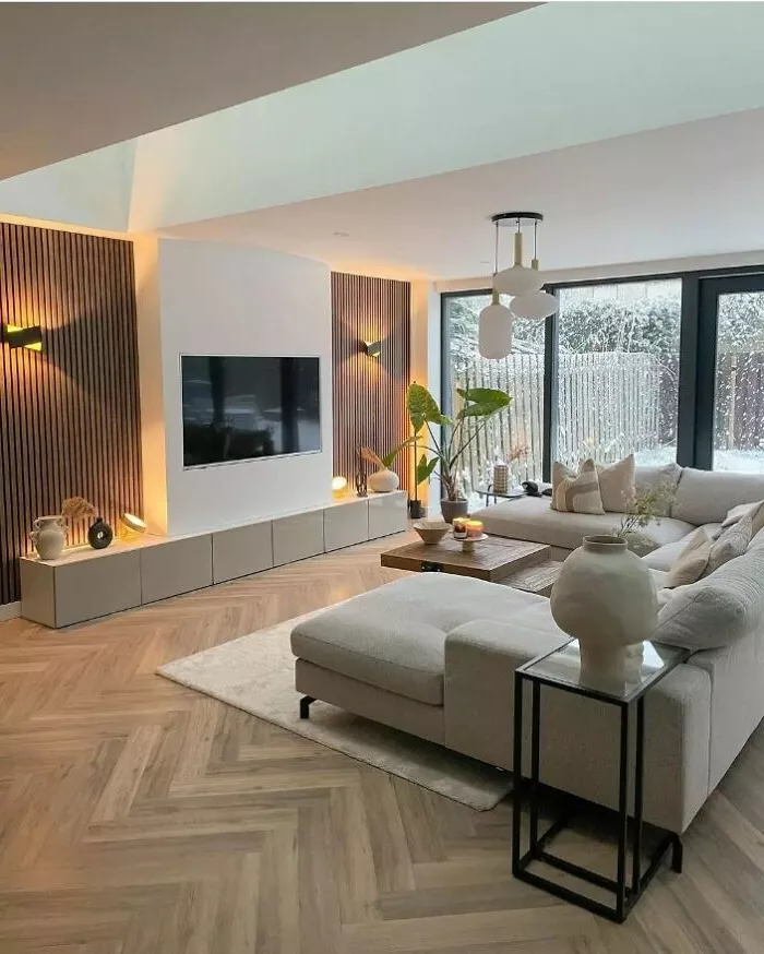 Discover the serene blend of contemporary design and natural aesthetics in this cozy, modern Scandinavian living room.