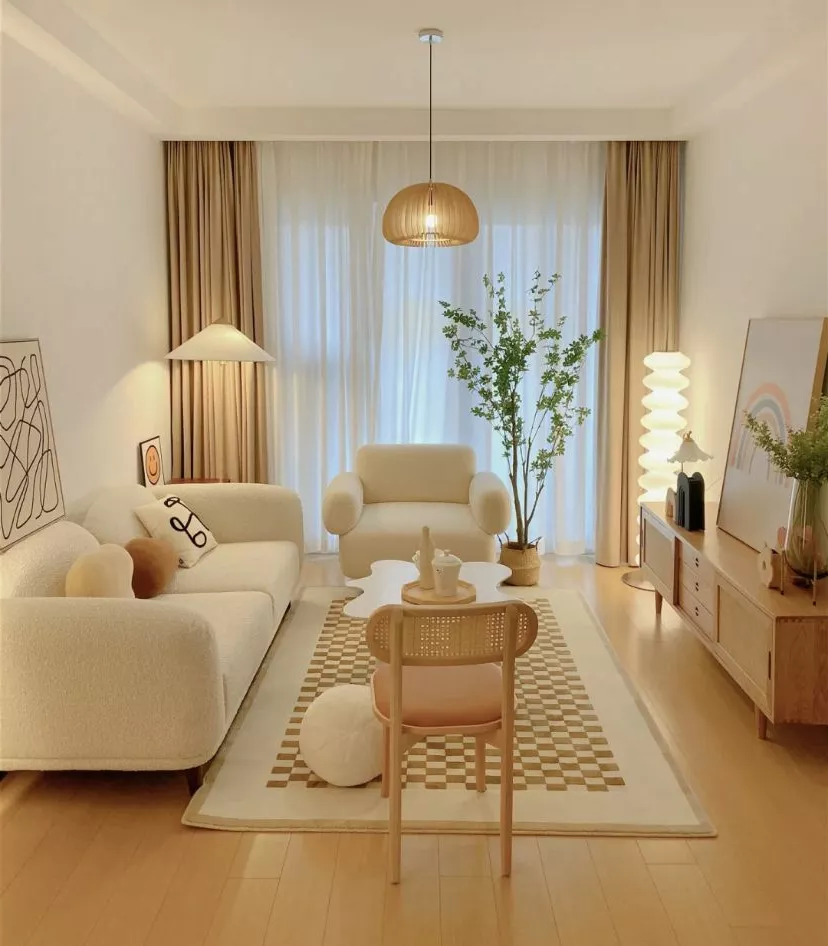 Explore the serene beauty of this Scandinavian-inspired living room, featuring minimalist decor and warm, neutral tones.