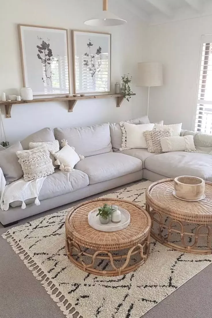 Relax in a minimalist bohemian style living room featuring neutral tones, textured pillows, and woven accents.