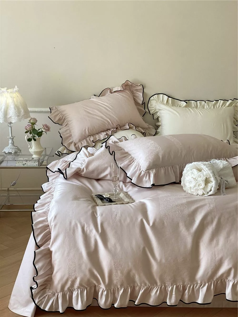 Transform your bedroom into a romantic sanctuary with these elegant ruffled bed linens, featuring delicate detailing and soft hues.