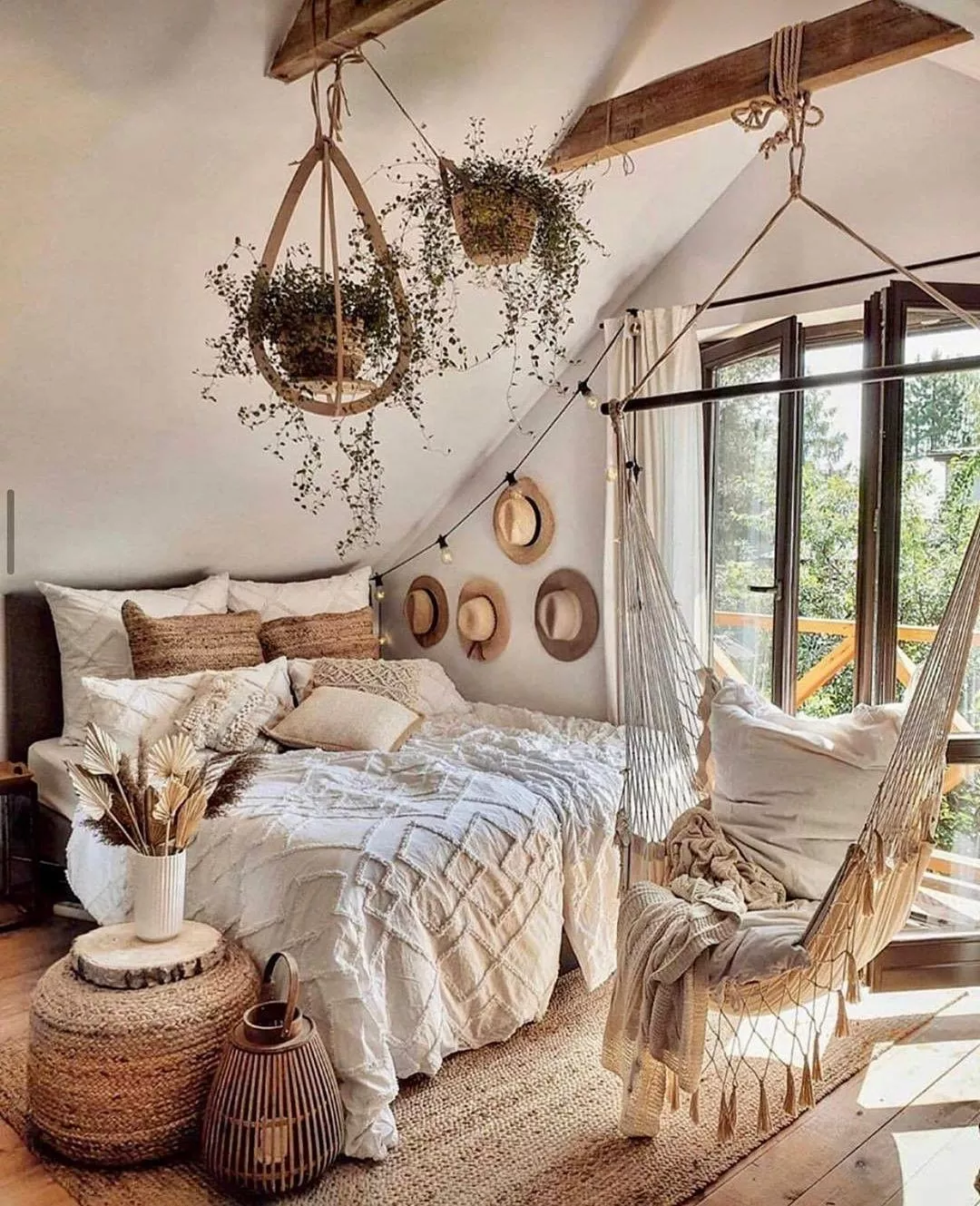 Transform your bedroom into a serene boho retreat with cozy hammock seating, lush hanging plants, and natural accents for a truly relaxing oasis.