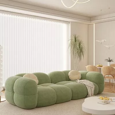 Discover tranquility with our sage green bouclé sofa, seamlessly blending plush comfort and modern design in your home. Perfect for any minimalist aesthetic.