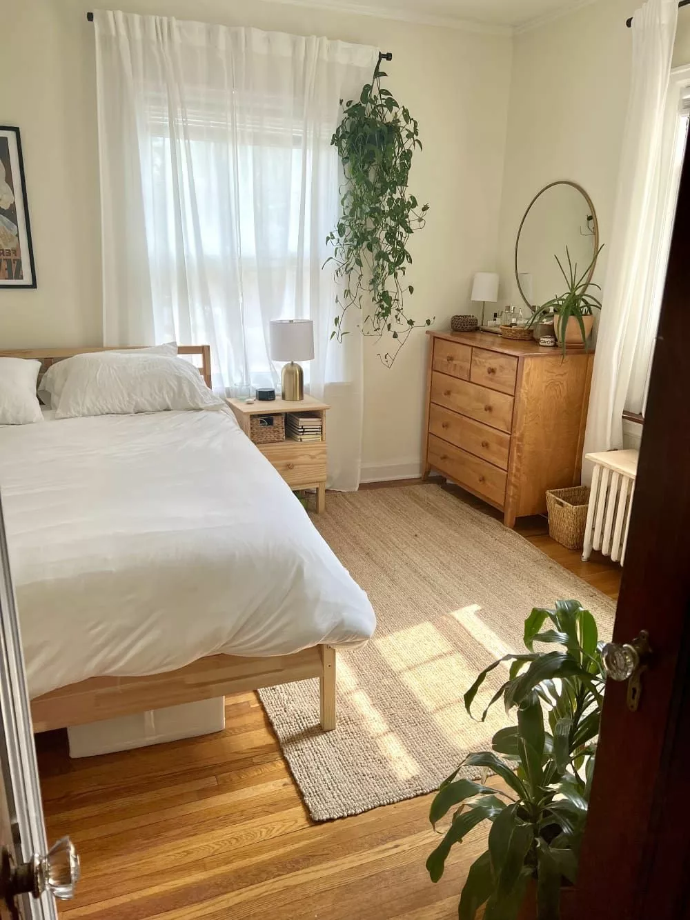 Discover the perfect blend of minimalist design and natural elements in this serene Scandinavian bedroom setup.