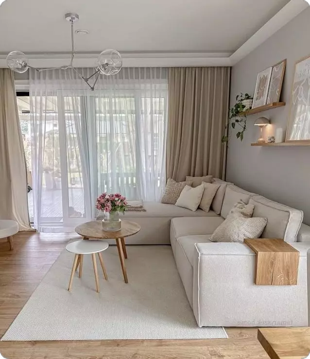 Experience tranquility with this Scandinavian-inspired living room, showcasing minimalist design and cozy elegance.