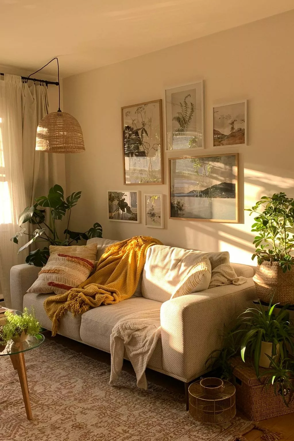 Bask in a sunlit bohemian style living room featuring warm accents, lush plants, and a cozy ambiance.