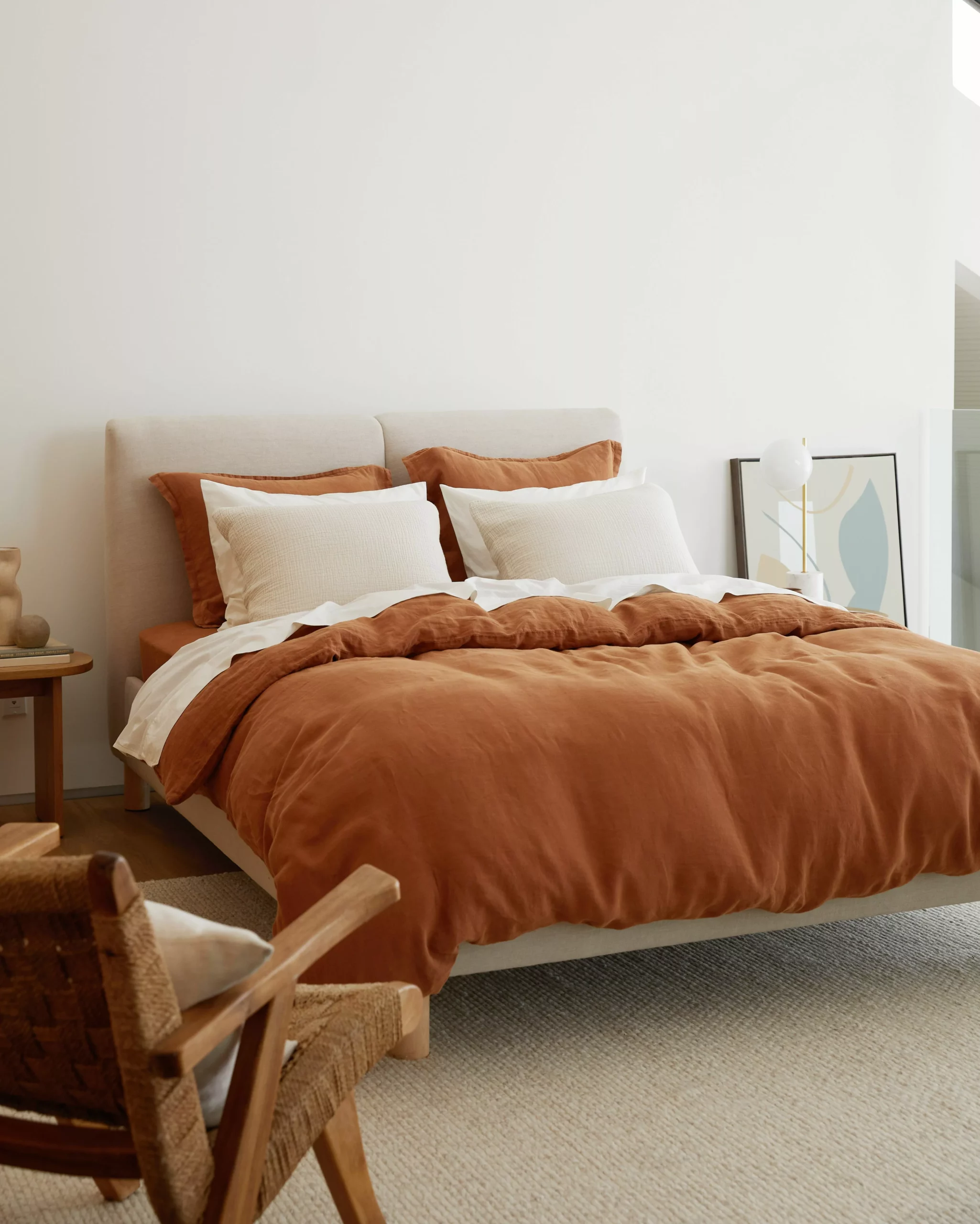 Transform your bedroom into a tranquil haven with cozy fabrics, warm hues, and stylish furniture.