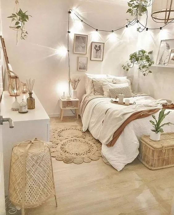 Transform your space into a whimsical haven with a cozy bohemian bedroom, featuring fairy lights, natural textures, and serene decor.